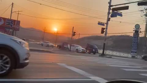 driving while watching the sunset