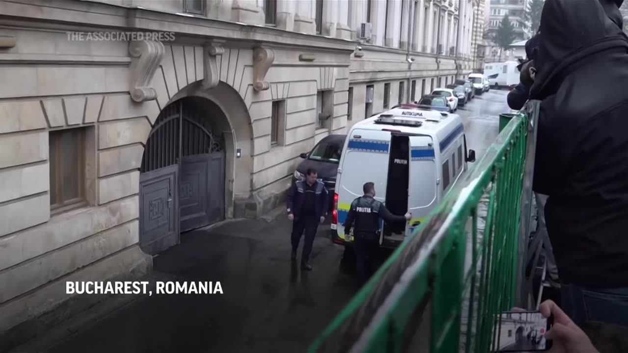 Tate detained in Romania, handed UK arrest warrant, his spokesperson says