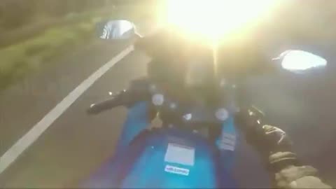 Biker Drives Blind Into Sun