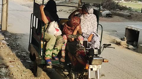 Village Women Traveling on Riksha