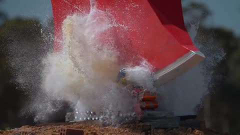 Giant Axe Vs. 10 Fire Extinguishers!