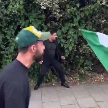 Brits who had gathered in front of “The Council of Ulama and Islamic Centres of Britain” building