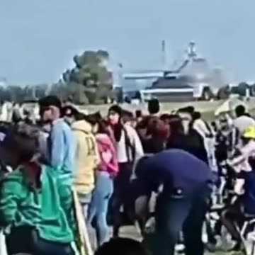 In a shocking moment, a vintage fighter jet crashes and explodes