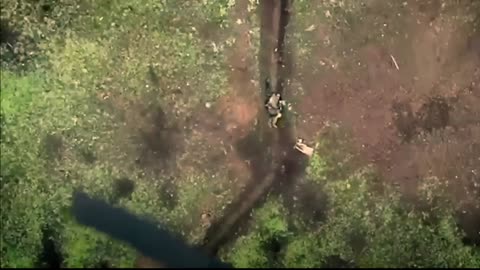 Moment Russian soldier catches and throws away Ukrainian 'drone bombs