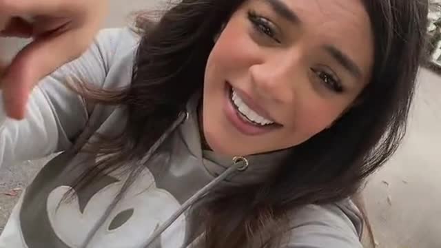 Then she came smiling, chatty
