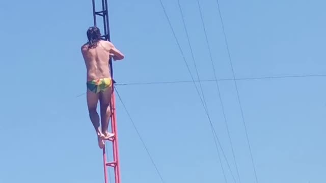 High Diving Performer Executes Jump Perfectly