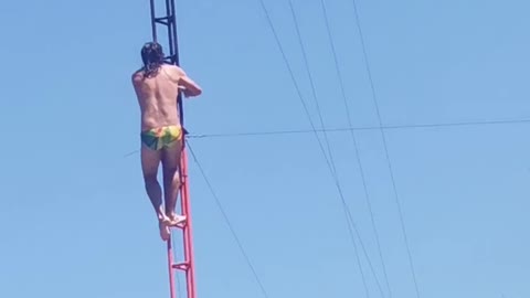 High Diving Performer Executes Jump Perfectly