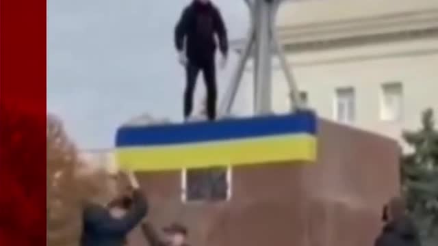 Ukrainian flags fly in Kherson after Russians retreat from the key southern city.