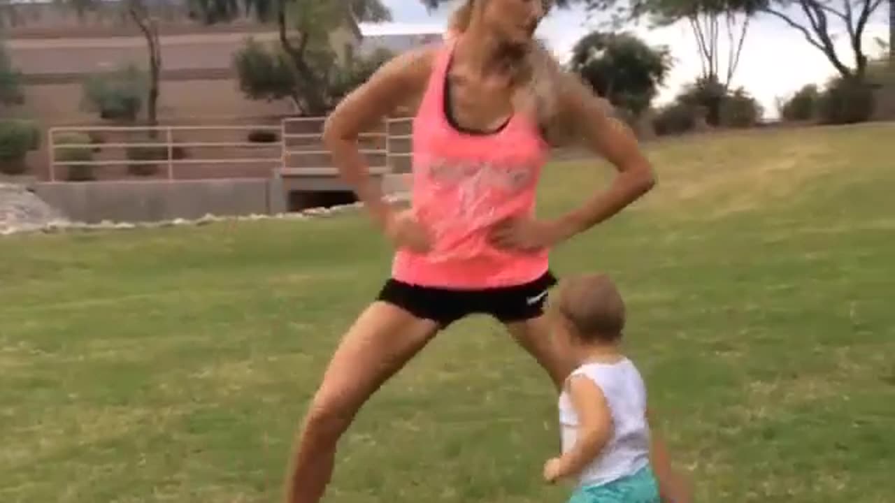 "Little Girl Copies Mom Workout"