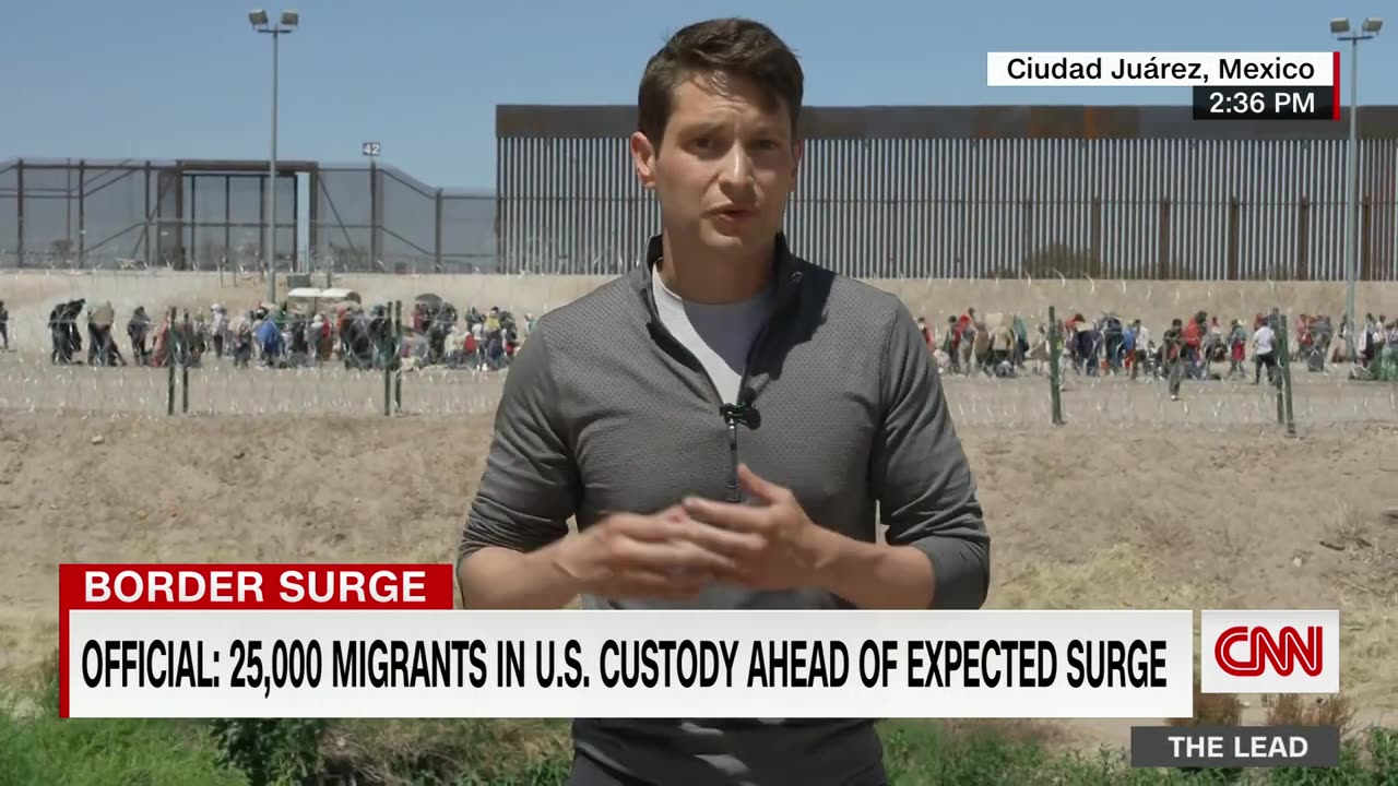 Video shows migrant crossing through barbed wired at US border