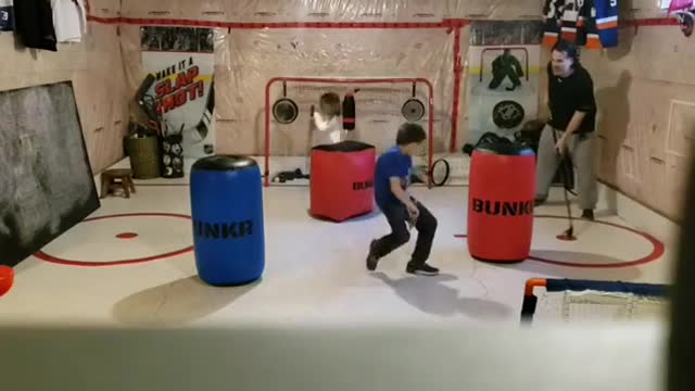 Dad Creates Setup Inside House to Play Hockey With Kids