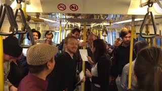 Train Passengers Sing Over the Rainbow!