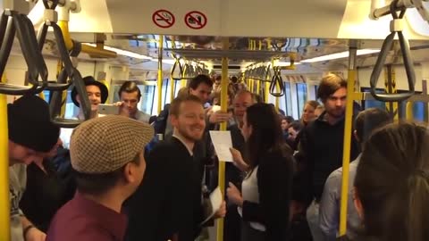 Train Passengers Sing Over the Rainbow!