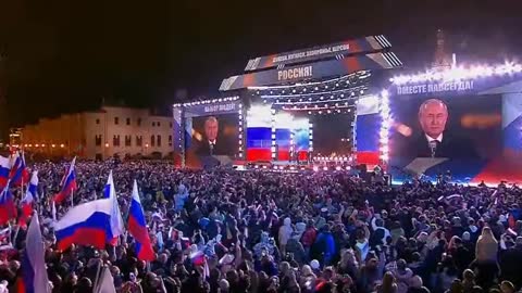 Crowd chants "Russia, Russia, Russia" in Moscow's Red Square as Putin makes an appearance