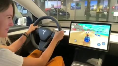 71_ THIS is how Tesla entertains you while loading your car Model Y