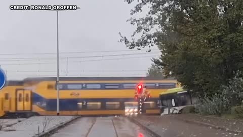 A train smashed into an empty bus in Bergen op Zoom, Netherlands