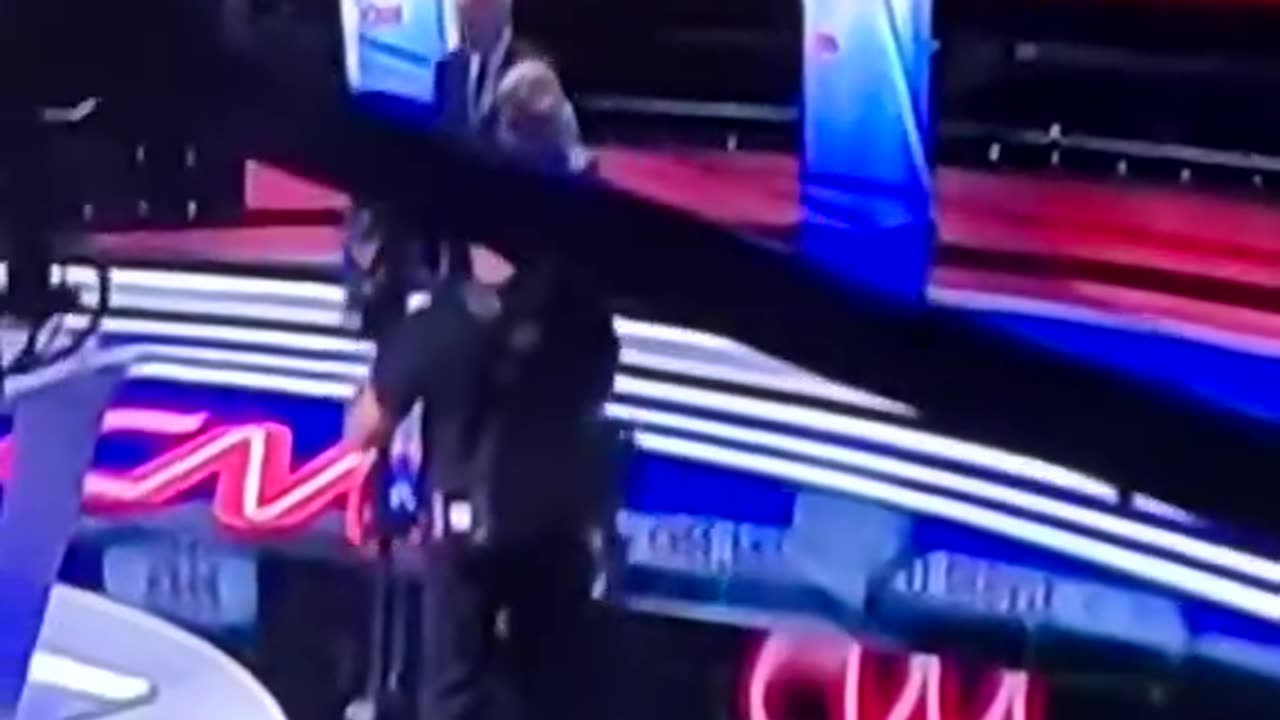 Joe Biden get escorted off the stage!