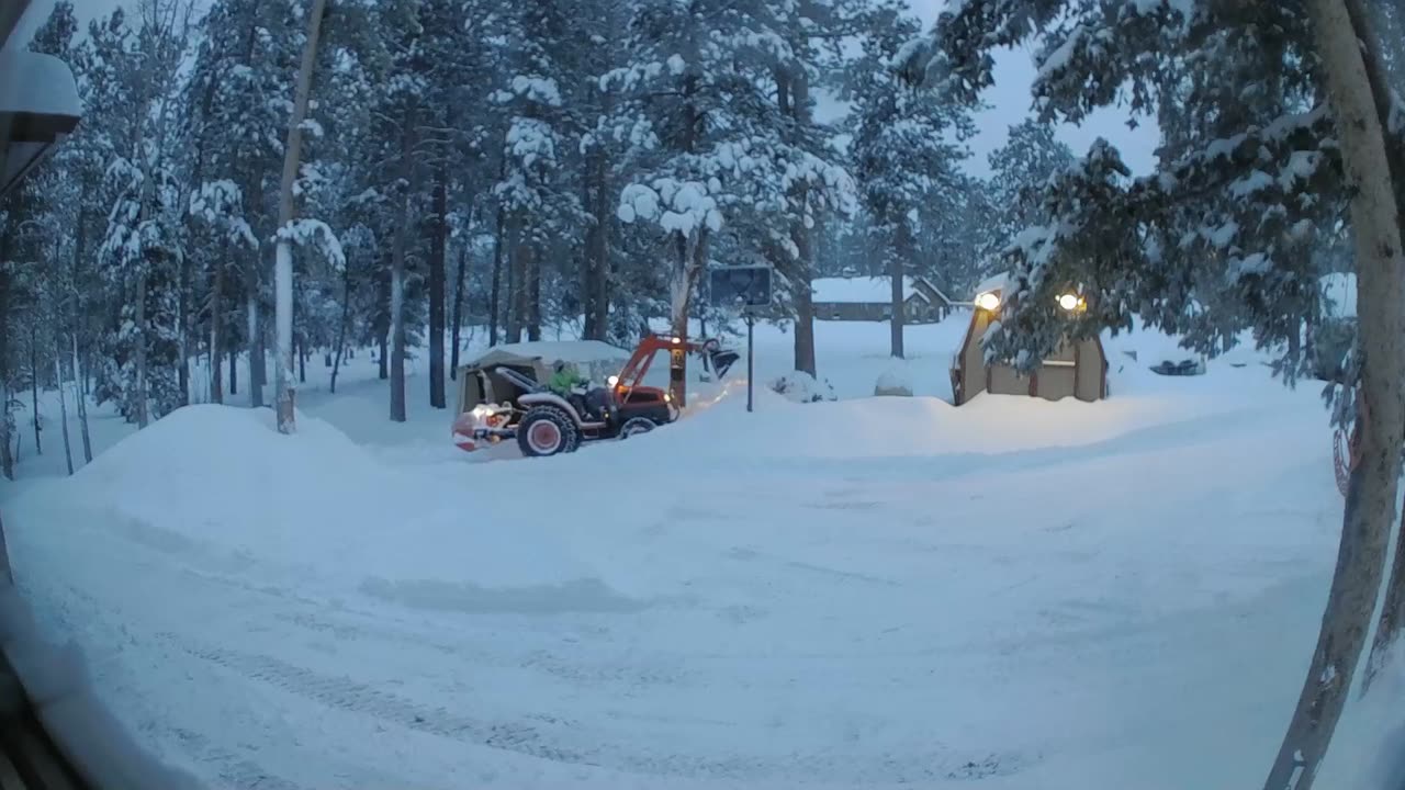 Tractor pushing Snow