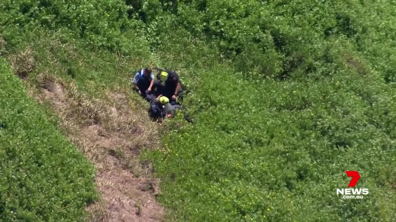 Paraglider survives after crashing on Sydney's northern beaches