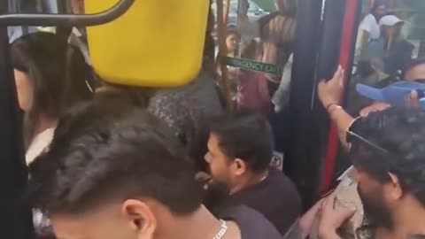 Trying to get on a bus in 2024 London. It literally looks like India.