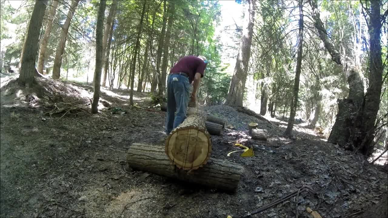 Step-by-step instructions for cutting down the logs of a cotton cabin