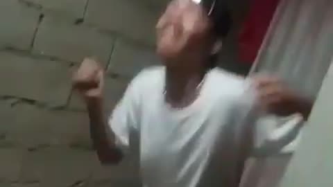 A Filipino Boy Happily Dancing Budots