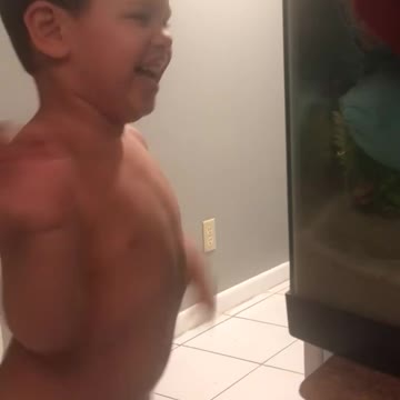 January 22, 2022, Elijah and fish tank.