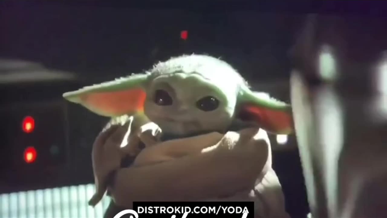 Baby Yoda playing music