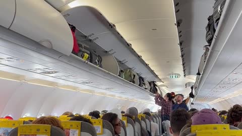 Airplane Passengers Applaud Special Announcement