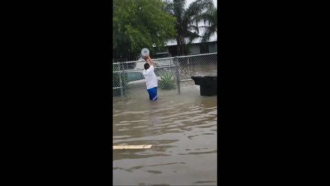 Guy Fails to Stop Flash Flood With Bucket