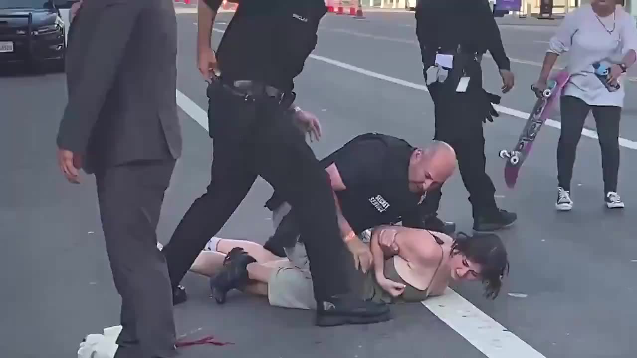 Lib protester Fs around and finds out what happens when you fight a cop