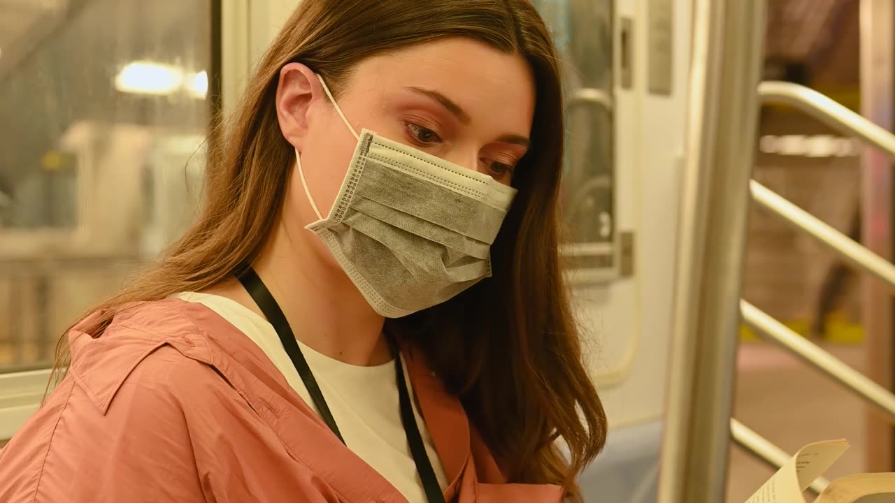 A woman Reading a Book Inside the Train and gets a crush