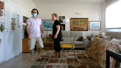 Teaching an un-limber woman how to rise from chair in 5 minutes - End result