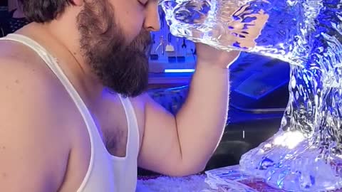 MAN MAKES OUT WITH ICE SCULPTURE