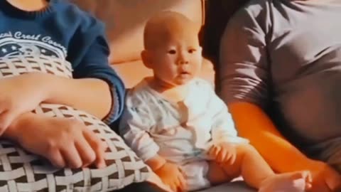 Cute baby while watching romantic videos.