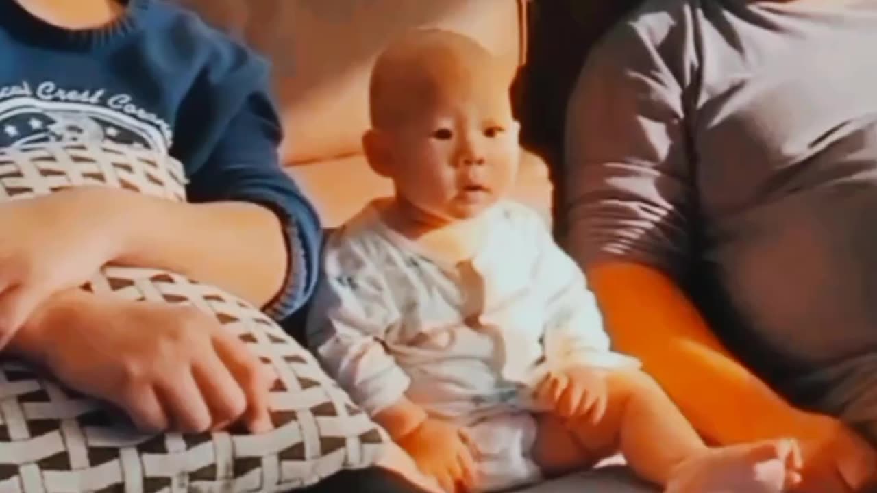 Cute baby while watching romantic videos.