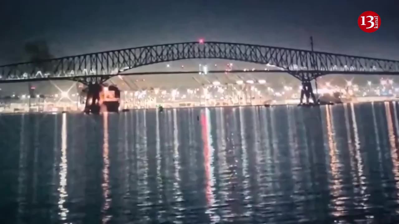 bridge collapses after being struck by large ship