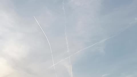 Sky trails over pontedera