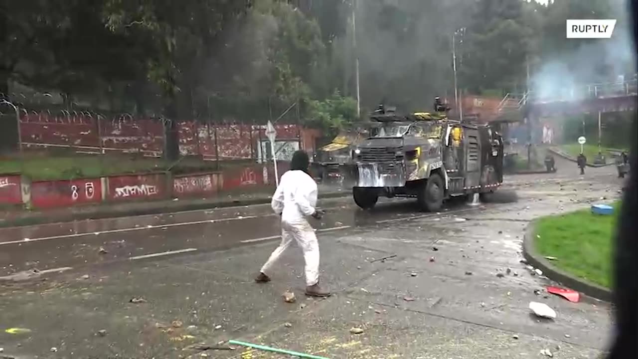 Violent clashes between police and protesters erupt at student rally in Bogotá, Colombia.