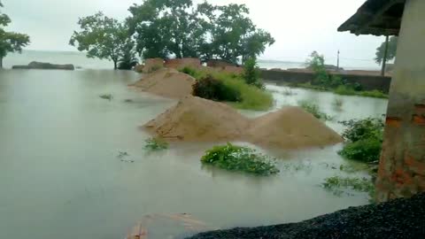 The village is in a state of flood due to heavy rainfall.see that