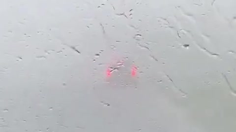 Person Drives Through Hailstorm Caused by Typhoon in Saskatchewan in Canada