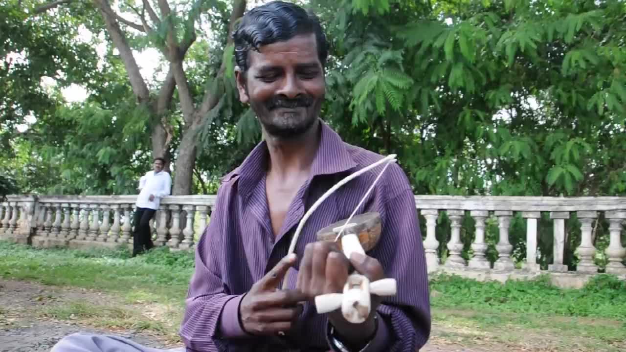 Rebirth of Mysterious Ancient Indian Violin Street Musician