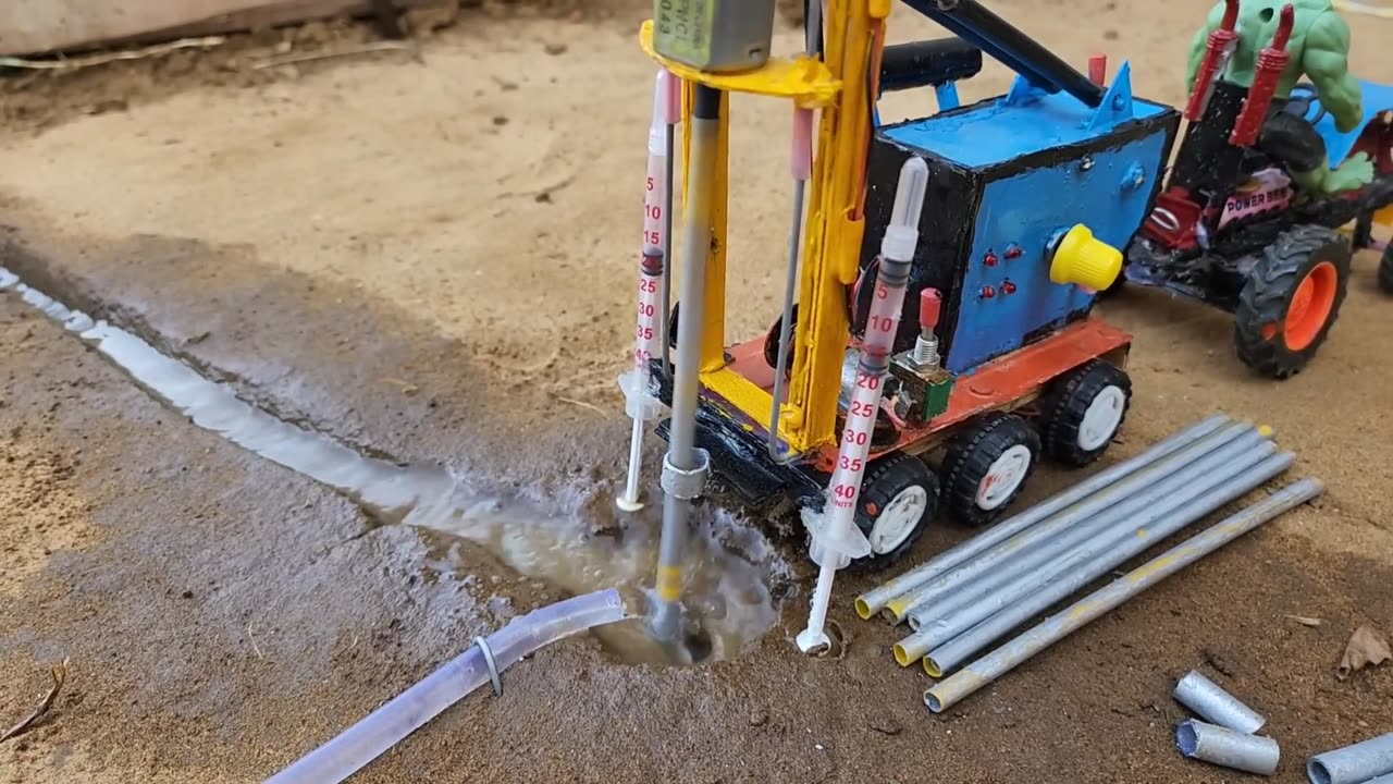 Diy tractor mini borewell drilling machine | science project | submersible water pump