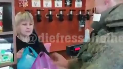 Ukrainian storekeeper refuses money from Russian soldier.