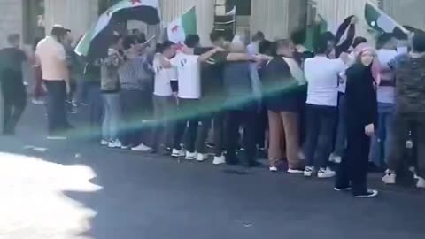 Nothing to see here, just a crowd of Syrian rebels outside the GPO in Dublin.