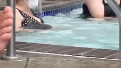 Double Masked woman sits in KIDDY POOL full of URINE