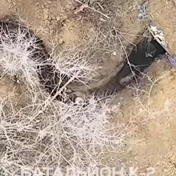 Ukrainian Soldier Working to Clear a Russian Dugout