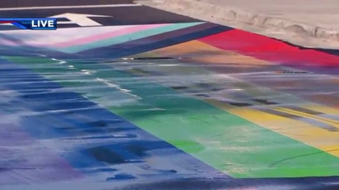 Police are looking for suspect that did a burnout on a painted Pride flag