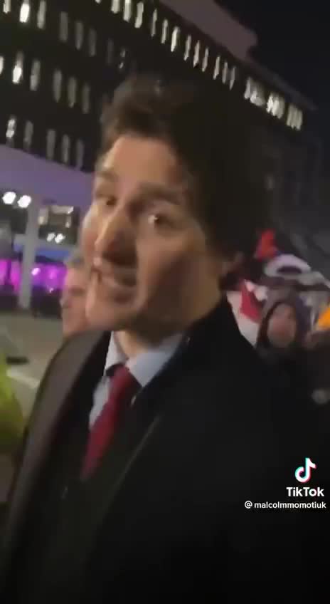 Lady screams at Trudea saying, “You have blood on your hands,” and he just laughs.