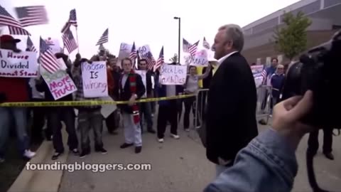 Andrew Breitbart single-handedly destroy a group of George Soros paid protesters